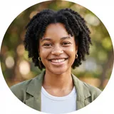 Young woman with short natural hair in a sage jacket